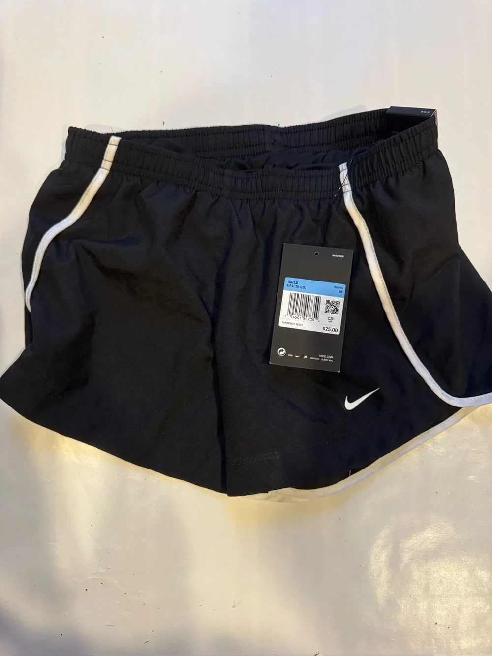 Nike Women’s Black Athletic Shorts with White Piping
